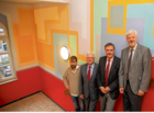 Eingeweiht: Benjamin Mastaglio, Eberhard Schmidt-Elsaeßer, Hartmut Blank und Albrecht Barthel (v. l.) in einem der neu gestalteten Treppenhäuser der Kaiser-Karl-Schule. Müller